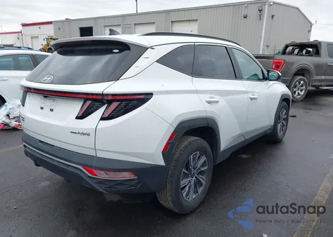 2022 Hyundai Tucson Hybrid Blue z USA, uszkodzony, nr VIN KM8JBCA11NU045645